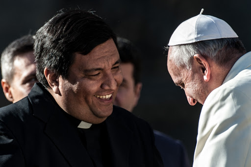 Pope Francis with Father Fabián Báez