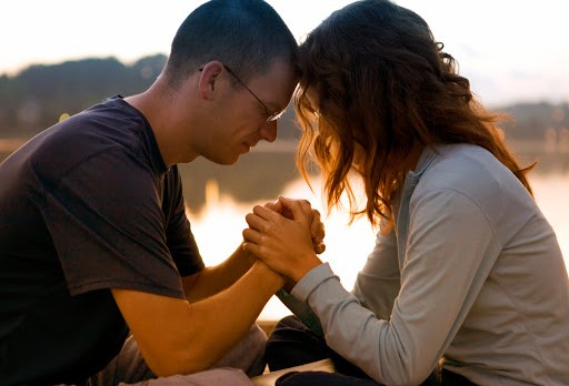 Couple praying together