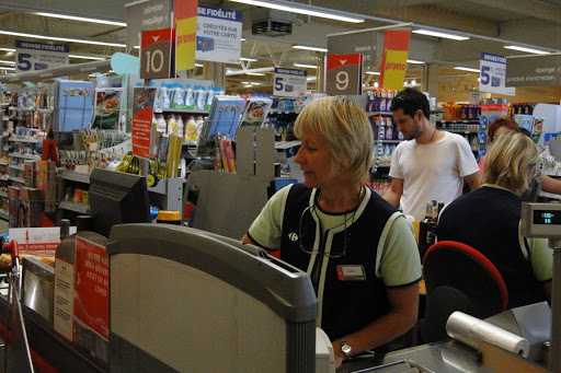 A cashier in a big supermarket &#8211; it
