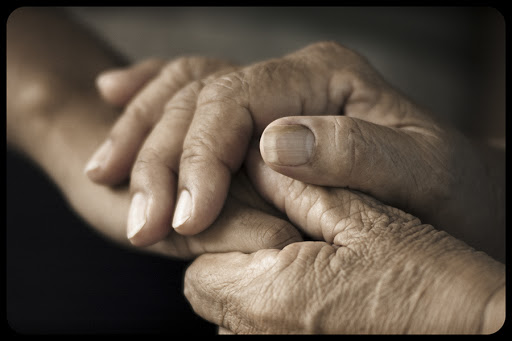 Holding hand © Richard Lyons / Shutterstock - it