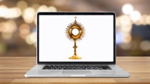 web-eucharist-adoration-laptop-online-shutterstock_384674077-charts-and-bg-c12-ai