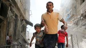 hero-aleppo-father-son-rubble-000_ln7sa-ameer-alhalbi-afp