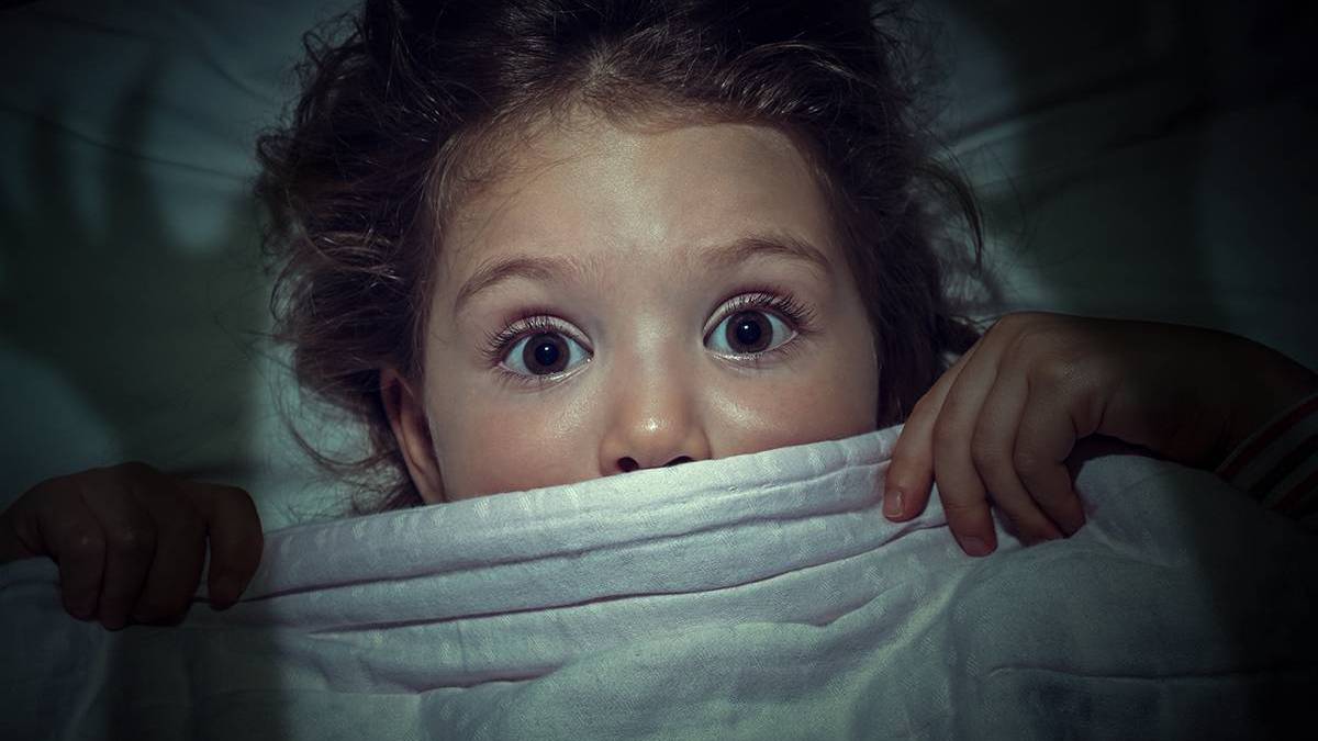 web-little-girl-afraid-dark-covers-bed-blanket-morrowind-shutterstock_393494134