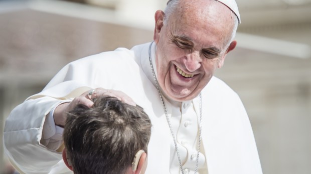 Pope Francis blessing boy