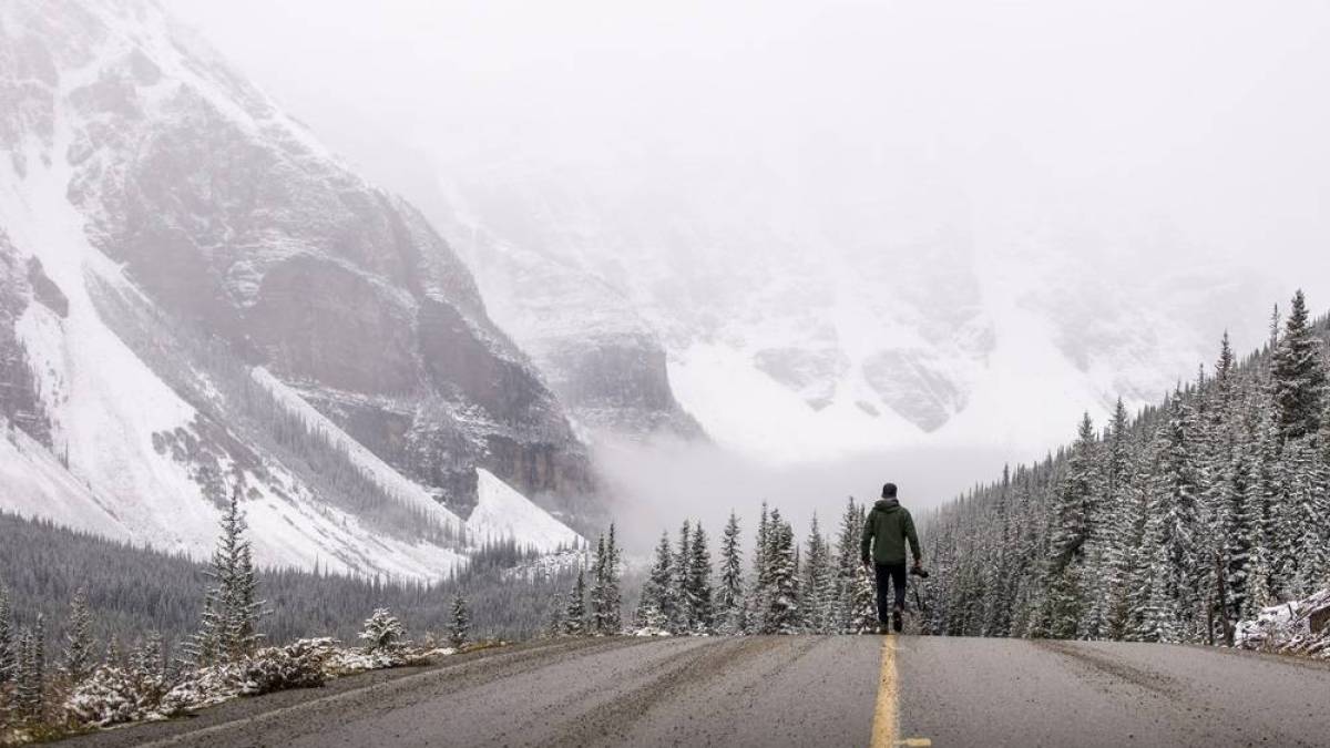 web-man-walking-canada-winter-tslphoto-shutterstock