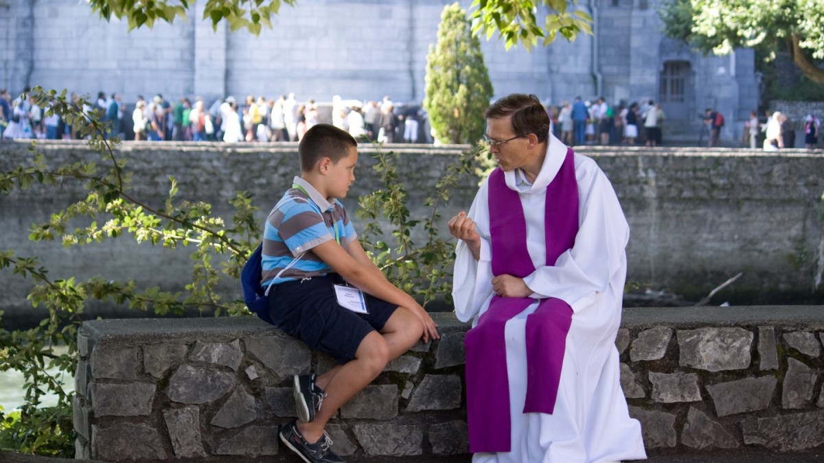 WEB COMMUNION CONFESSION LOURDES BOY flickr Fr Lawrence Lew, O.P.-cc