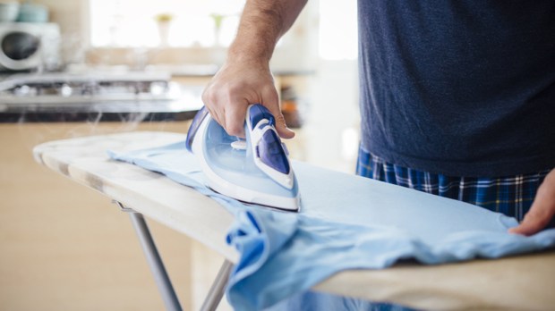 web3-man-ironing-kitchen-housework-dglimages-shutterstock