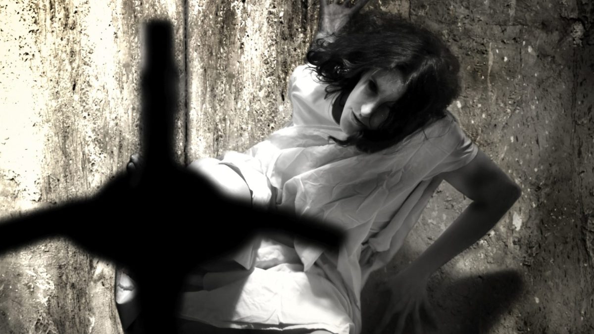 Exorcism and woman possessed by devil grunge unique concept