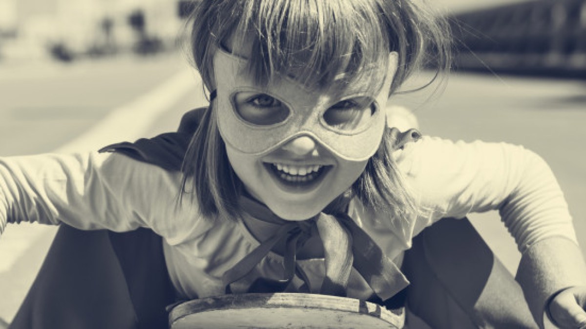 WEB3 LITTLE GIRL MASK FUN HAPPY PLAYING Shutterstock