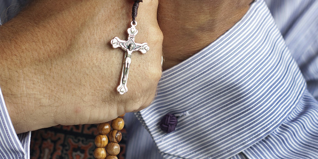 web3-rosary-man-hands-business-cuff-shirt-mr-nixon-shutterstock_420337462