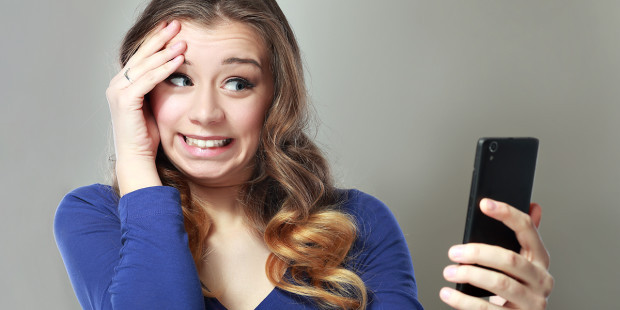 web3-young-woman-blue-phone-addicted-shutterstock