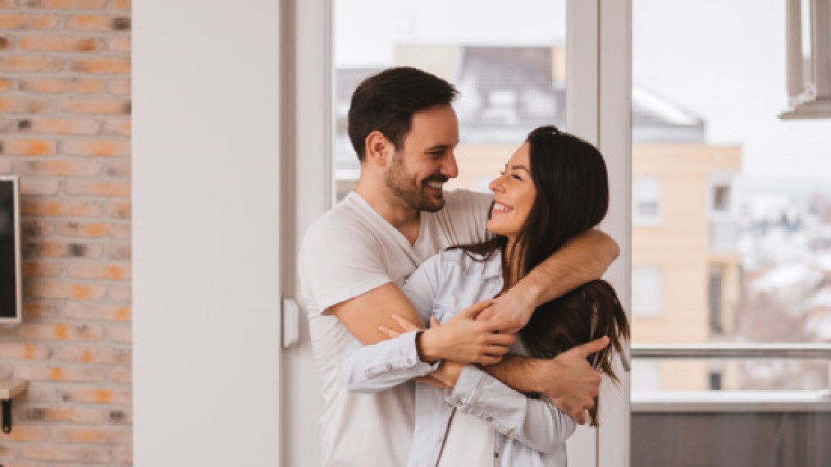 web3-young-couple-hug-home-branislav-nenin-i-shutterstock