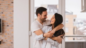 web3-young-couple-hug-home-branislav-nenin-i-shutterstock