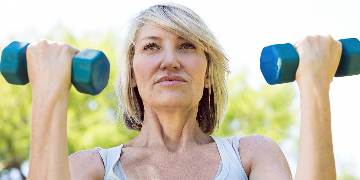 WOMAN EXERCISING