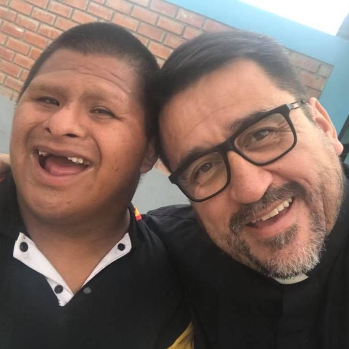 DOWNS SYNDROME,PRIEST