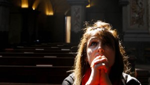 WOMAN PRAYING