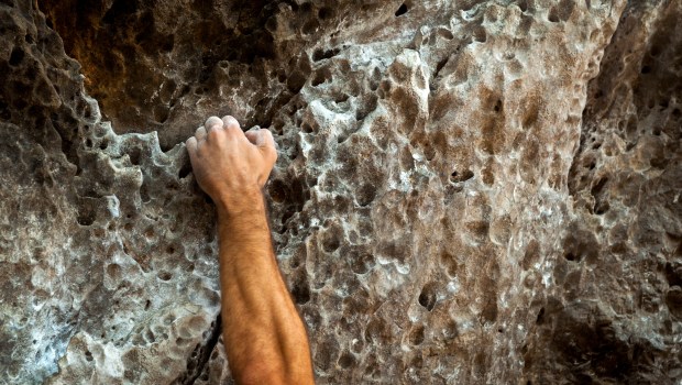 MALE HAND CLIMBING