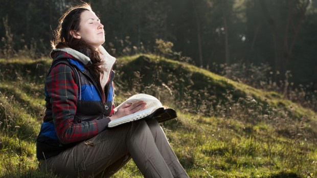 WOMAN,OUTDOORS,PRAYING