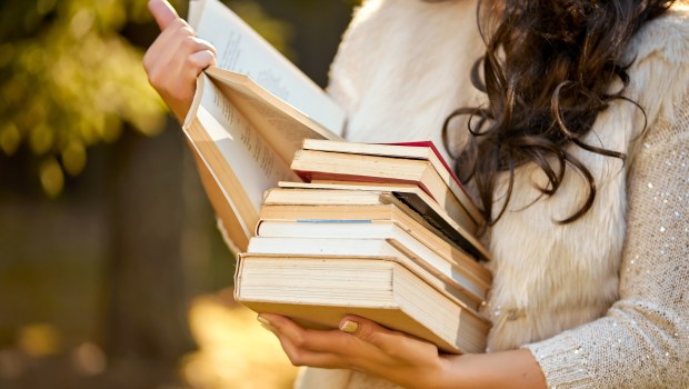 GIRL WITH BOOKS
