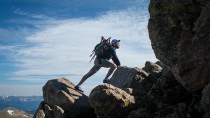 MAN CLIMBING