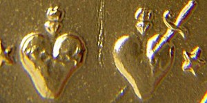 Perchè nella Medaglia Miracolosa ci sono i cuori di Gesù e Maria?
