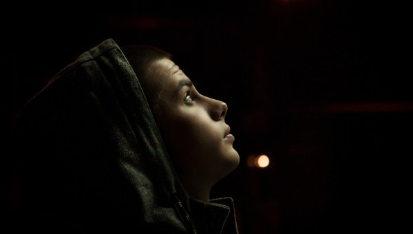 YOUNG MAN DARK BACKGROUND