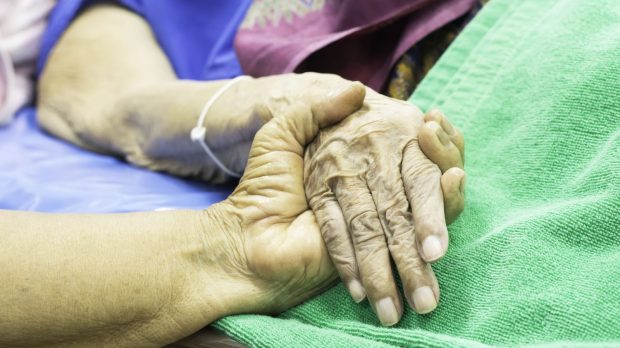 web3-elderly-woman-hands-hospital-e1556126598944.jpg