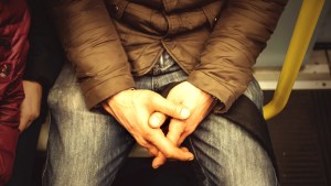 MAN SITTING METRO