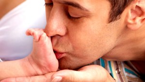 MAN AND NEWBORN