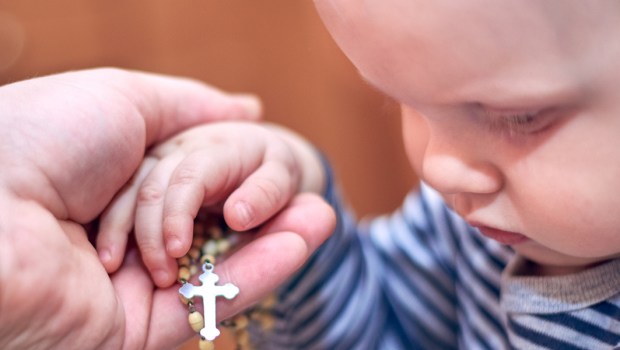 HANDS, ROSARY, CHILD