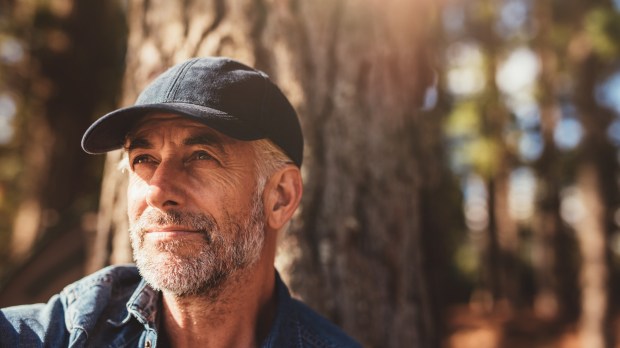 web2-close-up-portrait-of-senior-man-wearing-cap-looking-away.-mature-man-with-beard-sitting-in-woods-on-a-summer-day-shutterstock_380241097.jpg