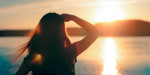 woman looking at the sunset