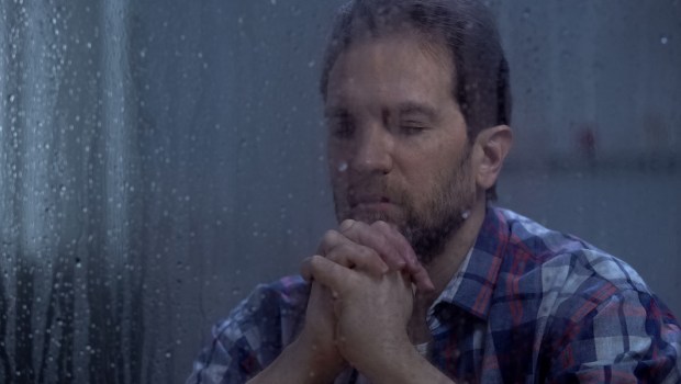 adult man praying