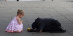 little girl gives money homeless
