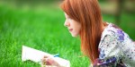 redhead girl writing