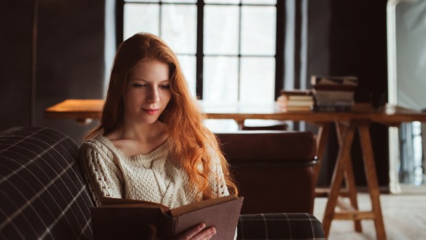 woman reading book