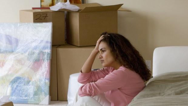 WOMAN, PACKING, SAD