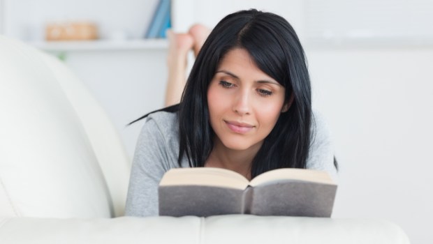 WOMAN READING BOOK,