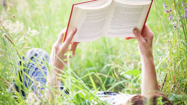 WOMAN, READING, LAWN