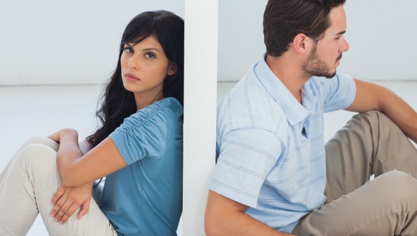 COUPLE, UNHAPPY, WALL