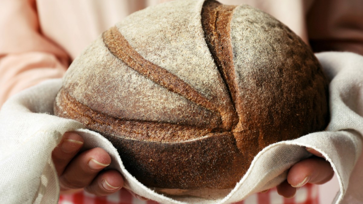 WOMAN, BREAD, HANDS