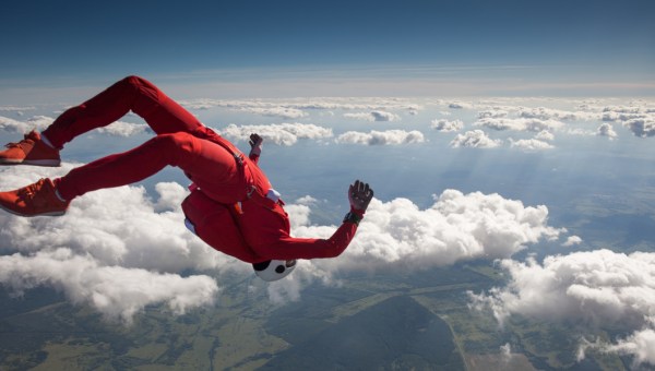 WOMAN, SKYDIVING