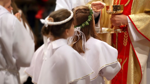 WEB3-Children-going-to-the-first-holy-communion-Shutterstock_420811108.jpg