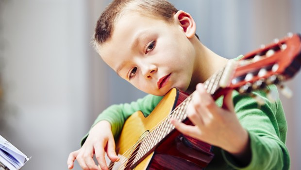PLAYING GUITAR