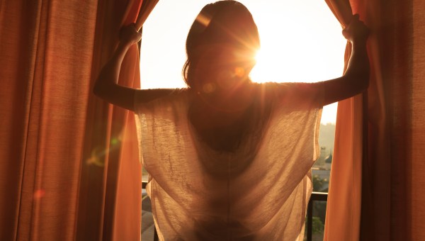 WOMAN, WINDOW, SUN
