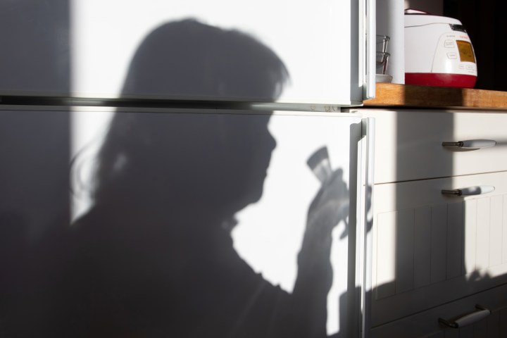 WOMAN, SHADOW, HOUSE