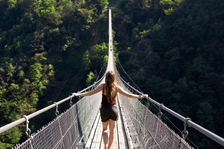 TIBETAN BRIDGE, WOMAN