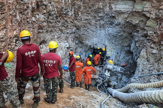 Indian emergency workers were scrambling June 14 to rescue a 10-year-old boy - Rahul Sahu-AFP
