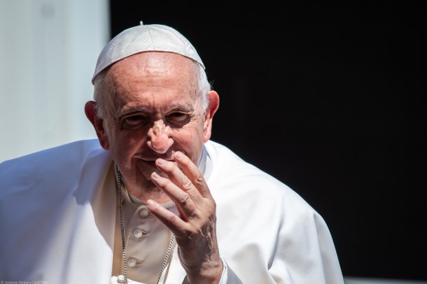 Pope Francis blesses faithful as he leaves St. Peter's square on the Popemobile