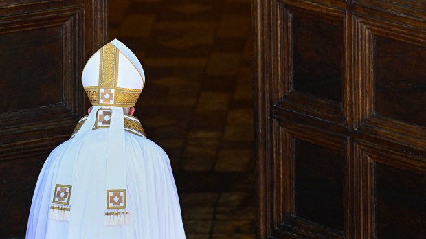 Pope-Francis-at-the-Duomo-cathedral-in-LAquila-AFP